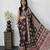 dark brown color mirror work border with handcrafted red tassels (latkan) and ajarakh print gajji silk blend saree