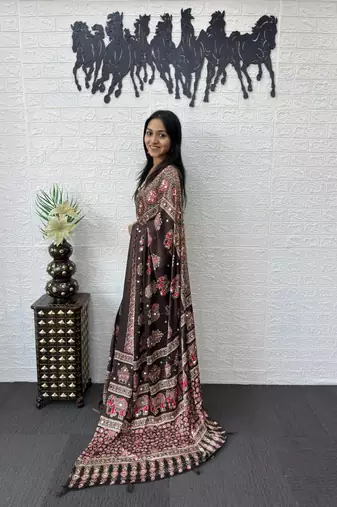 dark brown color mirror work border with handcrafted red tassels (latkan) and ajarakh print gajji silk blend saree