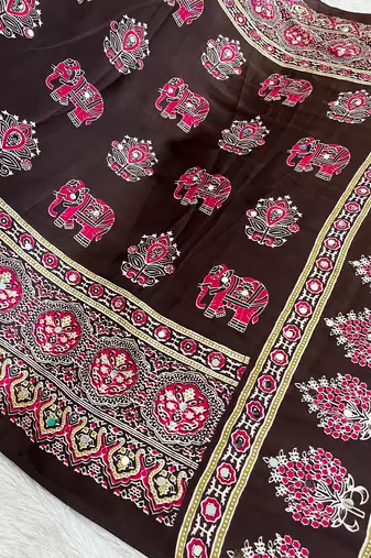 dark brown color mirror work border with handcrafted red tassels (latkan) and ajarakh print gajji silk blend saree