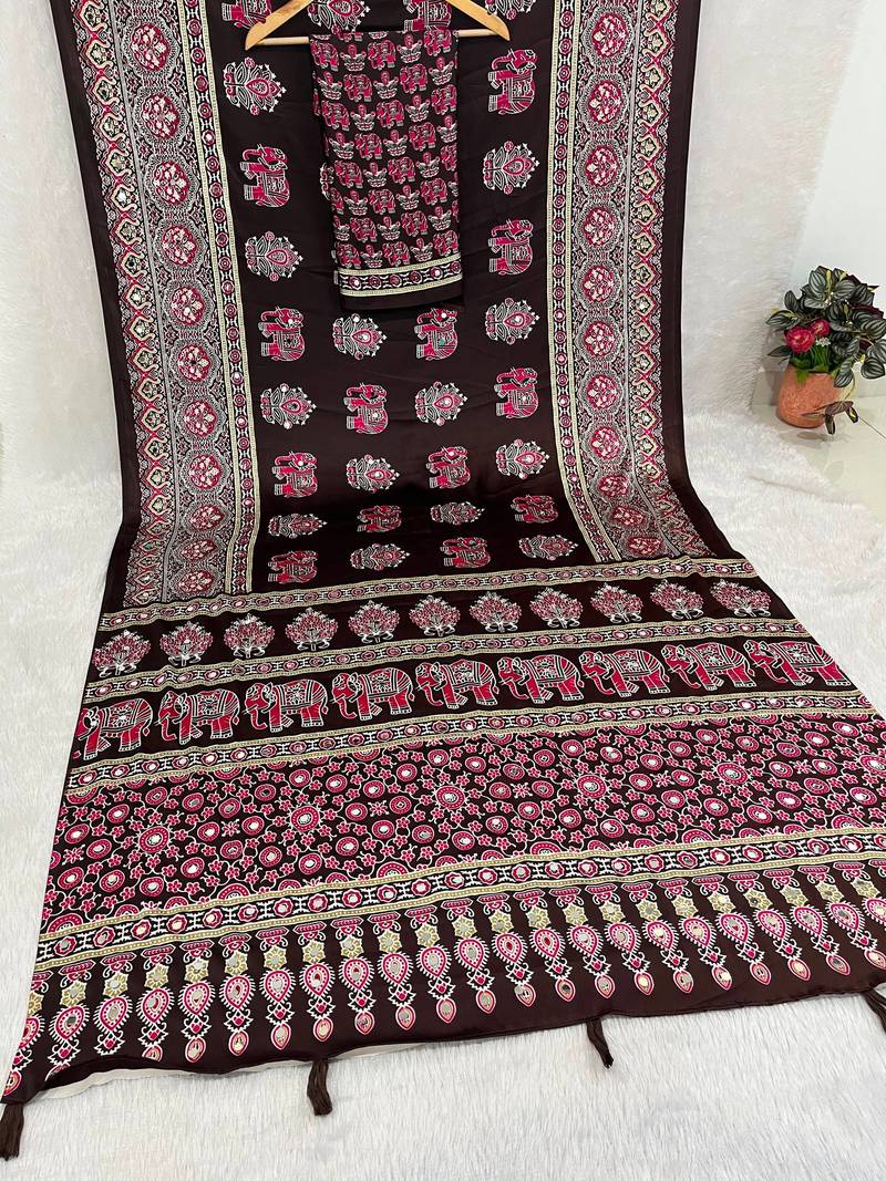 dark brown color mirror work border with handcrafted red tassels (latkan) and ajarakh print gajji silk blend saree
