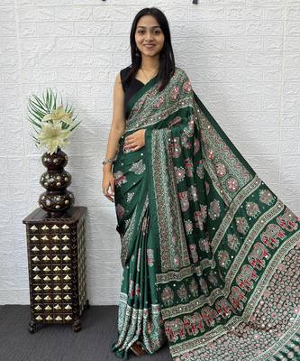 green color mirror work border with handcrafted red tassels (latkan) and ajarakh print gajji silk blend saree 1