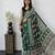 green color mirror work border with handcrafted red tassels (latkan) and ajarakh print gajji silk blend saree