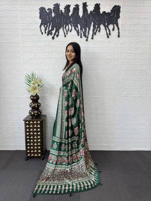 green color mirror work border with handcrafted red tassels (latkan) and ajarakh print gajji silk blend saree 2