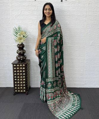 green color mirror work border with handcrafted red tassels (latkan) and ajarakh print gajji silk blend saree 3