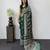 green color mirror work border with handcrafted red tassels (latkan) and ajarakh print gajji silk blend saree