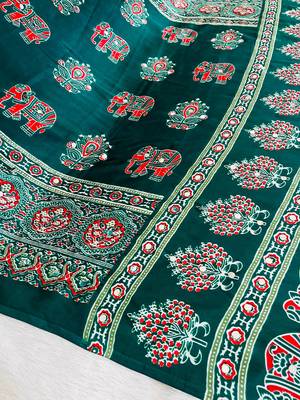 green color mirror work border with handcrafted red tassels (latkan) and ajarakh print gajji silk blend saree 4