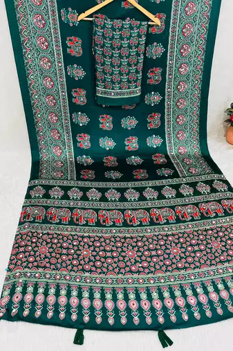 green color mirror work border with handcrafted red tassels (latkan) and ajarakh print gajji silk blend saree