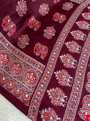 maroon color mirror work border with handcrafted red tassels (latkan) and ajarakh print gajji silk blend saree 2