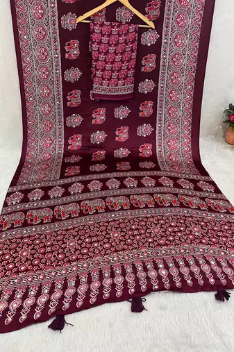maroon color mirror work border with handcrafted red tassels (latkan) and ajarakh print gajji silk blend saree