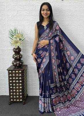 neavy blue color mirror work border with handcrafted red tassels (latkan) and ajarakh print gajji silk blend saree 1