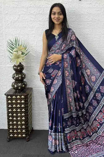 neavy blue color mirror work border with handcrafted red tassels (latkan) and ajarakh print gajji silk blend saree