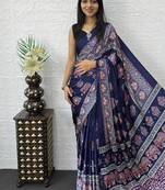 neavy blue color mirror work border with handcrafted red tassels (latkan) and ajarakh print gajji silk blend saree