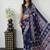 neavy blue color mirror work border with handcrafted red tassels (latkan) and ajarakh print gajji silk blend saree