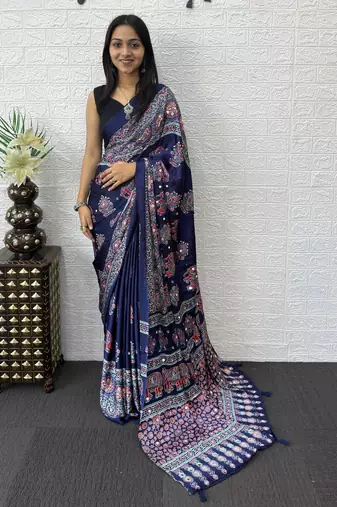 neavy blue color mirror work border with handcrafted red tassels (latkan) and ajarakh print gajji silk blend saree
