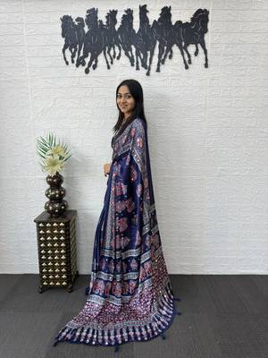 neavy blue color mirror work border with handcrafted red tassels (latkan) and ajarakh print gajji silk blend saree 3