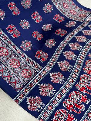 neavy blue color mirror work border with handcrafted red tassels (latkan) and ajarakh print gajji silk blend saree 4