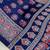 neavy blue color mirror work border with handcrafted red tassels (latkan) and ajarakh print gajji silk blend saree