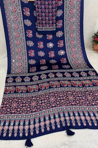 neavy blue color mirror work border with handcrafted red tassels (latkan) and ajarakh print gajji silk blend saree