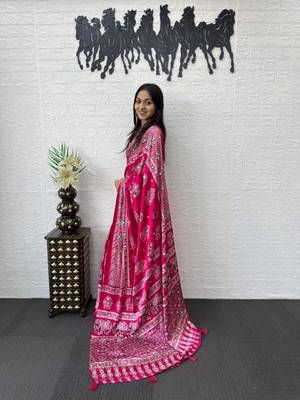 rani pink color mirror work border with handcrafted red tassels (latkan) and ajarakh print gajji silk blend saree 2