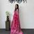 rani pink color mirror work border with handcrafted red tassels (latkan) and ajarakh print gajji silk blend saree