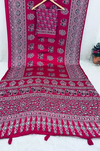 rani pink color mirror work border with handcrafted red tassels (latkan) and ajarakh print gajji silk blend saree
