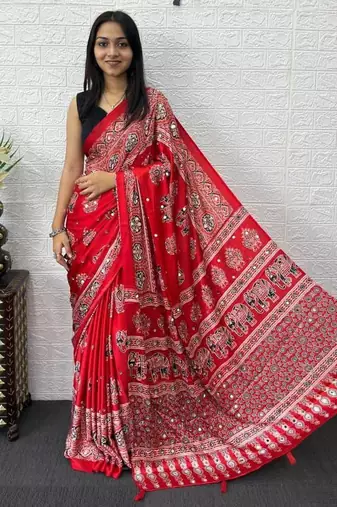 red color mirror work border with handcrafted red tassels (latkan) and ajarakh print gajji silk blend saree