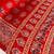 red color mirror work border with handcrafted red tassels (latkan) and ajarakh print gajji silk blend saree