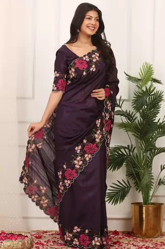 purple color multi color thread work on border with cutwork silk blend saree