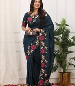 teal color multi color thread work on border with cutwork silk blend saree