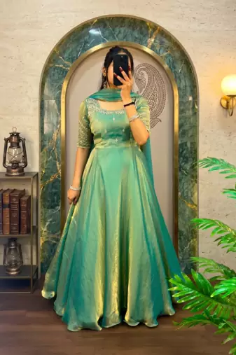 Pista green silk Blend party wear anarkali gown with zari embroidery