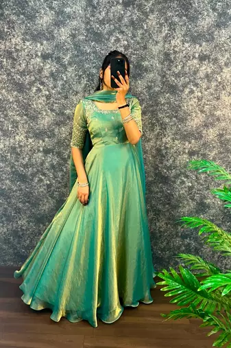 Pista green silk Blend party wear anarkali gown with zari embroidery