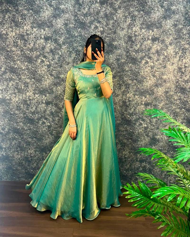 Pista green silk Blend party wear anarkali gown with zari embroidery