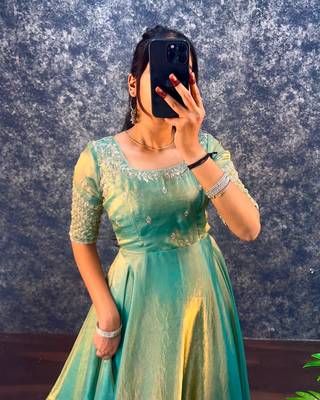Pista green silk Blend party wear anarkali gown with zari embroidery 2
