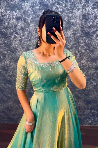 Pista green silk Blend party wear anarkali gown with zari embroidery