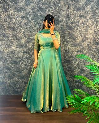 Pista green silk Blend party wear anarkali gown with zari embroidery 3