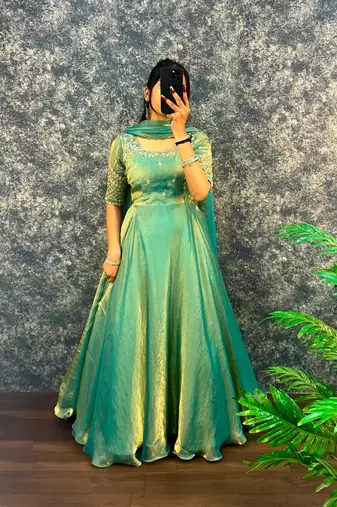 Pista green silk Blend party wear anarkali gown with zari embroidery
