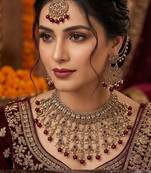 maroon mehndi-plated agate stone necklace set with earrings & maang tikka