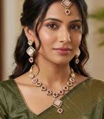 pink mehndi-plated agate stone necklace set with earrings & maang tikka
