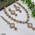 pink mehndi-plated agate stone necklace set with earrings & maang tikka