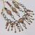 pink mehndi-plated agate stone necklace set with earrings & maang tikka