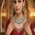 emerald green kundan necklace set with maang tika, earrings  royal zircon bridal jewellery