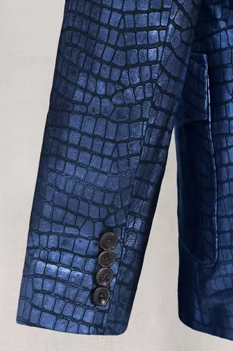 Men's matalic blue lambskin leather coat double-vented & sophisticated drape.
