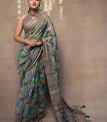 Green floral printed cotton blend saree with unstitched blouse piece