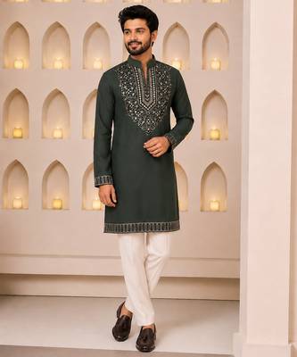 Dark bottle green silk blend heavy embroidered kurta with off white straight pant for wedding & festive wear 1