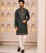 Dark bottle green silk blend heavy embroidered kurta with off white straight pant for wedding & festive wear