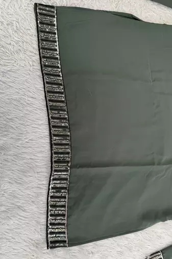Dark bottle green silk blend heavy embroidered kurta with off white straight pant for wedding & festive wear