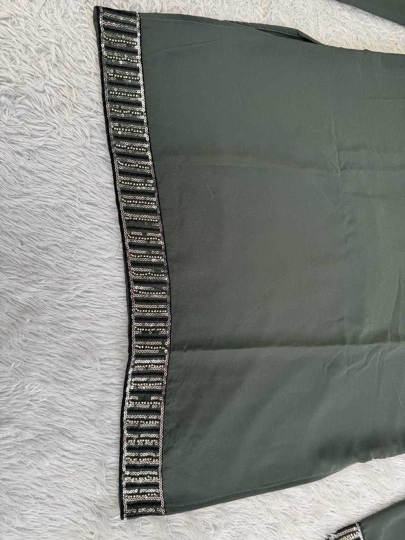Dark bottle green silk blend heavy embroidered kurta with off white straight pant for wedding & festive wear