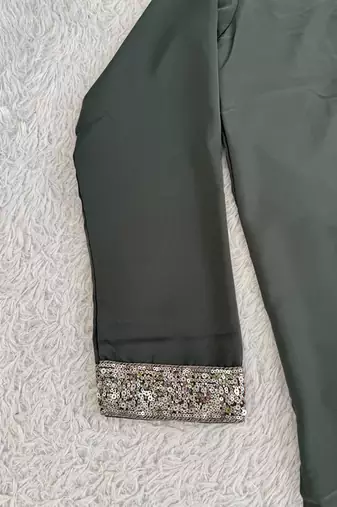 Dark olive green silk blend heavy thread & sequins embroidered kurta with off white straight pant