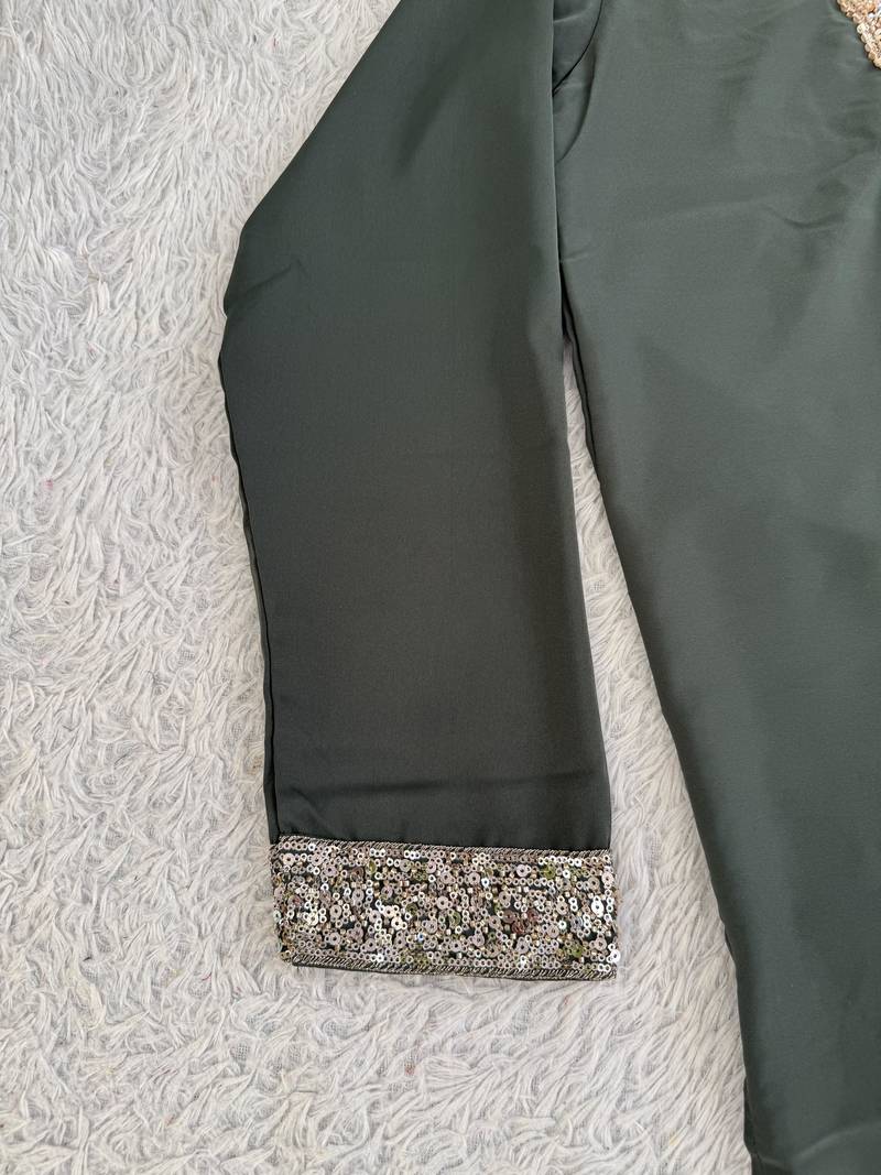 Dark olive green silk blend heavy thread & sequins embroidered kurta with off white straight pant