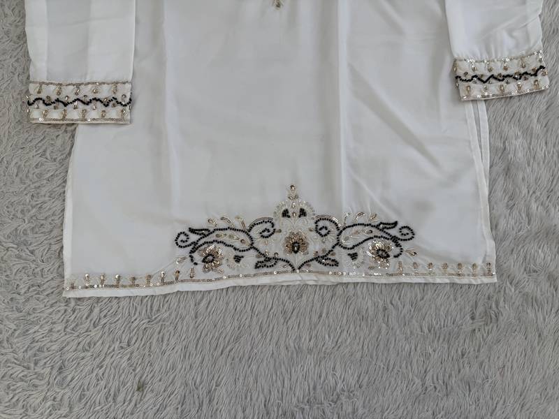 Off white silk blend heavy thread & sequins embroidered kurta with straight pant
